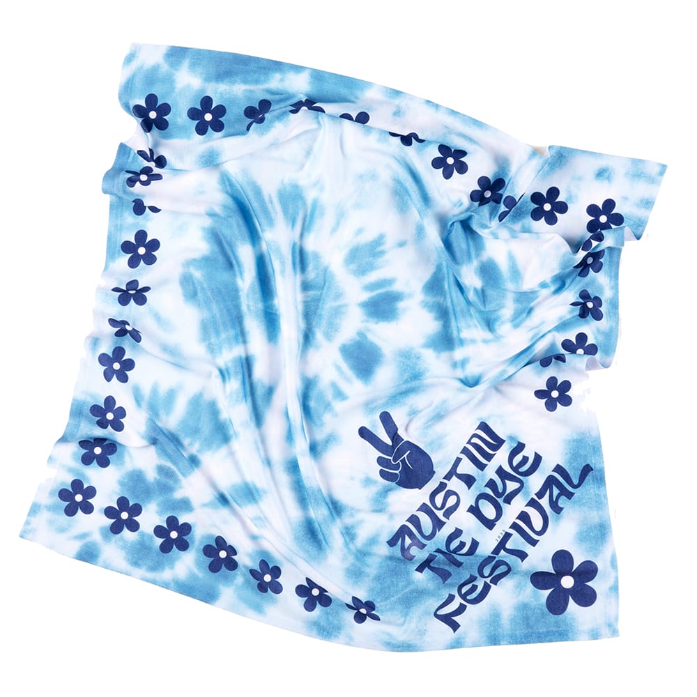 Close-up of a scrunched custom bandana showing the print
