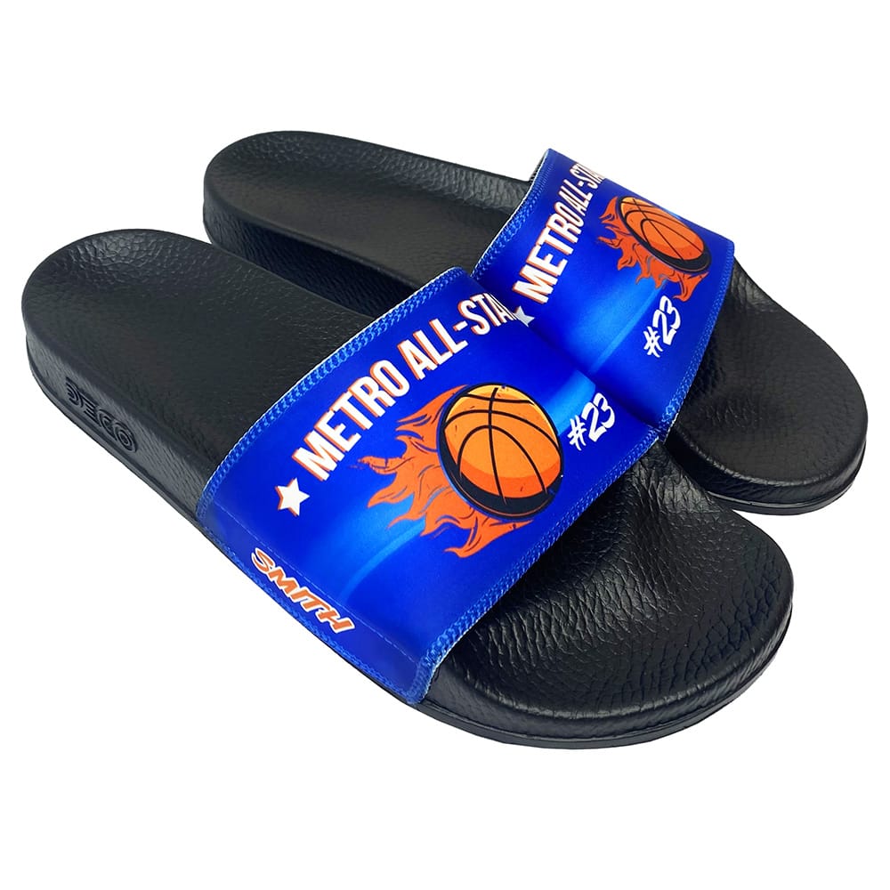 Black custom slides with a blue Metro All-Stars basketball strap and the number 23