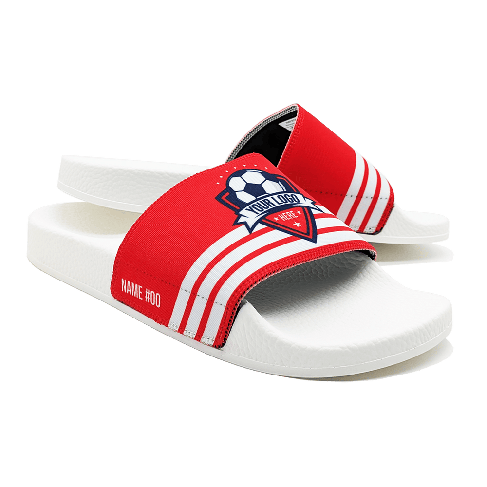 White slide sandals with a red strap and a logo for a generic soccer team