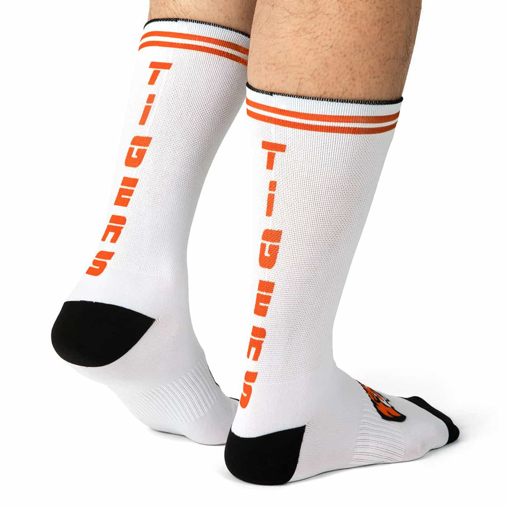 Posing with white socks with orange stripes and orange text reading 'Tigers'