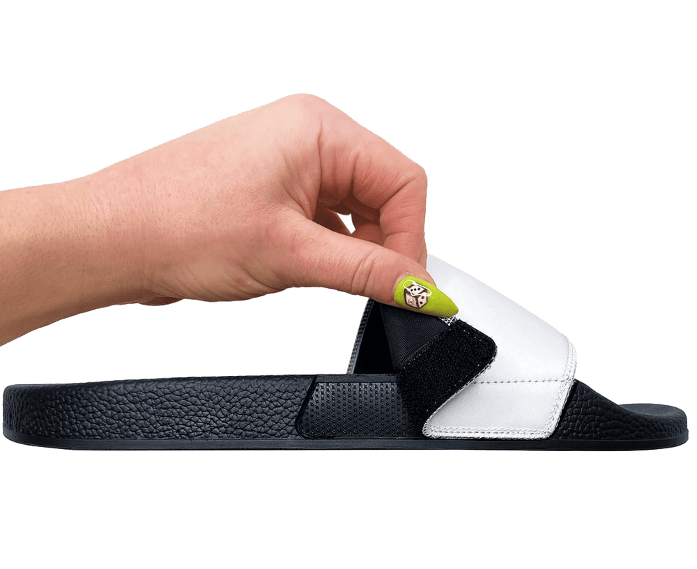 A Deco Slide outsole with its cushioned strap being swapped out for a different design